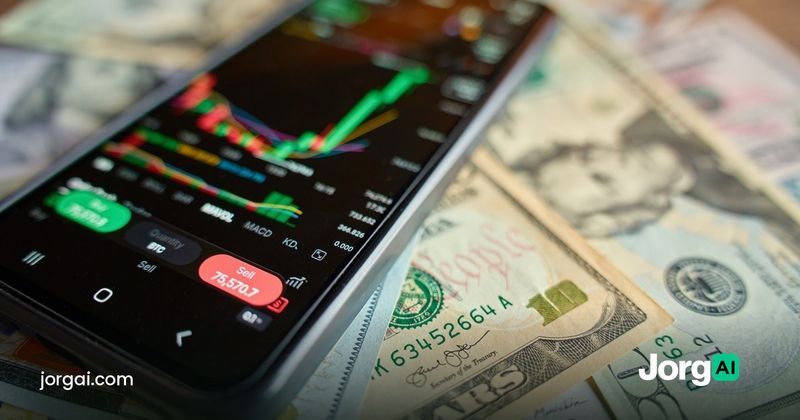 Phone showing a stock chart on top of dollar bills, illustrating Robinhood vs Charles Schwab in 2026