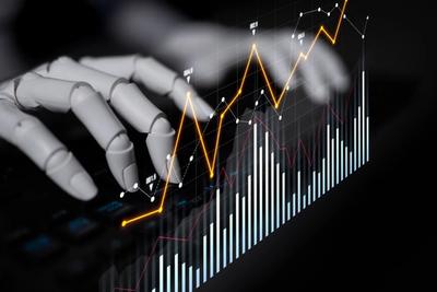 Robotic hand over a keyboard with a glowing line chart and bar graph overlay on a dark background