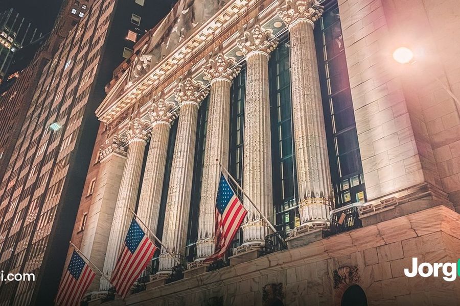The New York Stock Exchange building at dusk, open for trading on Columbus Day 2026 while the bond market is closed