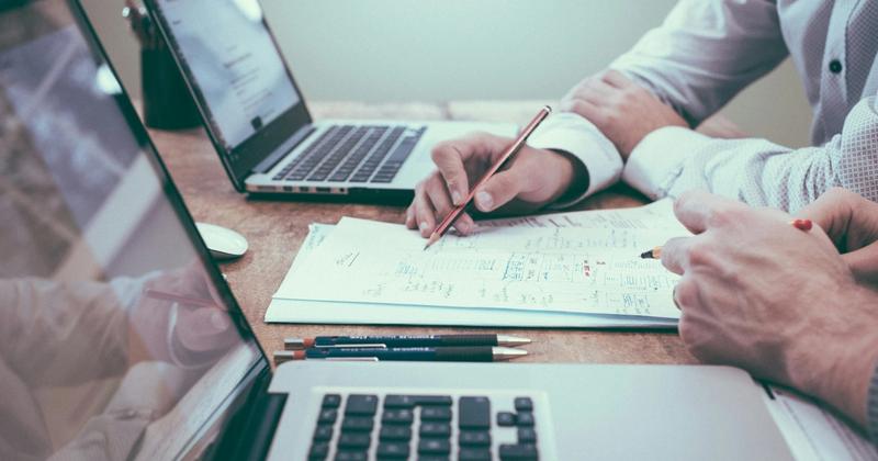 Analyst reviewing employment data charts ahead of the September 2026 jobs report release on October 2
