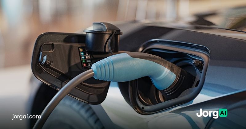 Charging cable plugged into an electric car, cover for the Tesla Q3 2026 results and earnings-reaction study