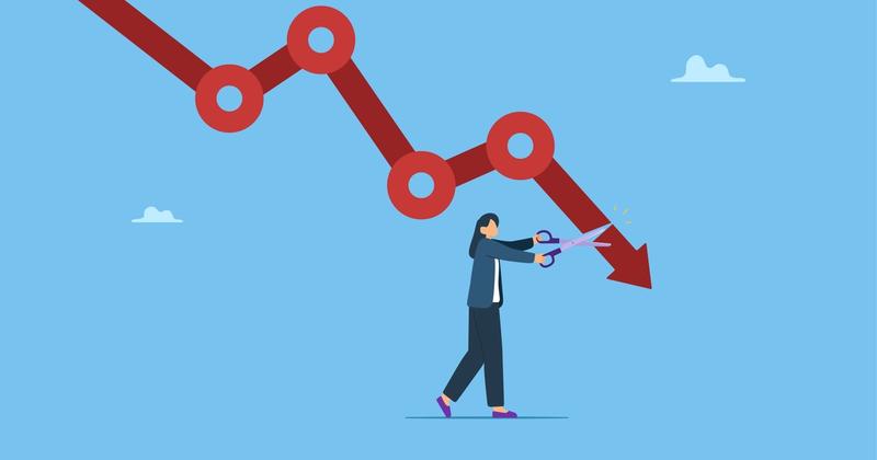 Illustration of a falling stock chart under pressure, representing markets bracing for a Federal Reserve rate decision