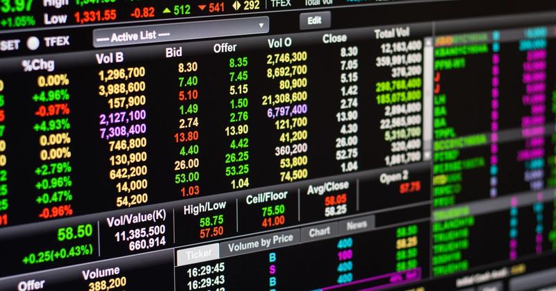 Close-up of a stock quote board with bid, offer and volume figures, representing the PCE inflation number the Fed watches