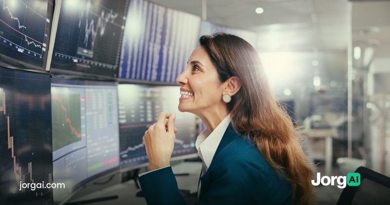 Trader smiling at a wall of stock charts, illustrating the Q3 2026 earnings season