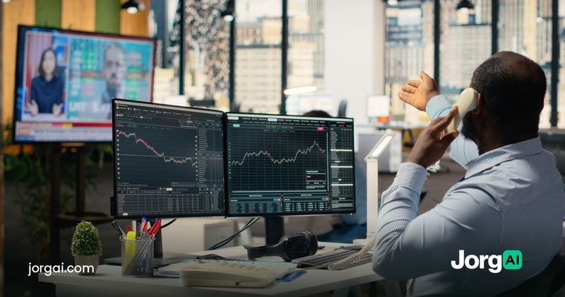 Trader on the phone at a desk with market charts and financial news on screen, the morning stocks rallied on the weak September 2026 jobs report