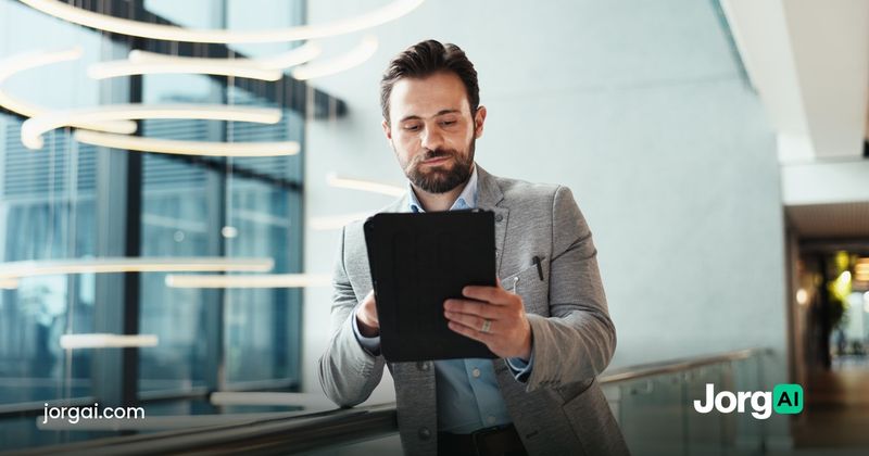 Investor reading results on a tablet in an office lobby, cover for the earnings season playbook