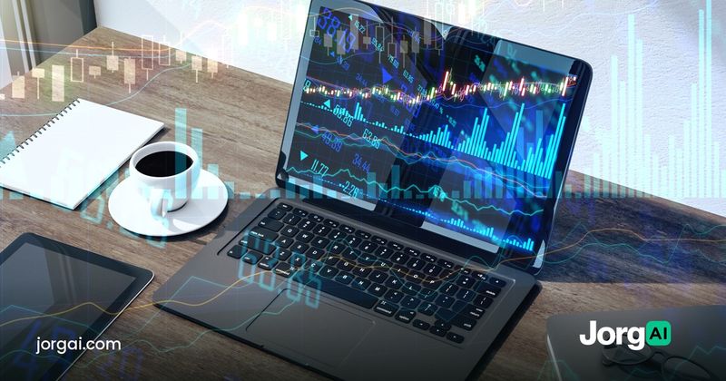 Laptop and tablet showing stock charts on a desk, cover for the broker API options automation comparison