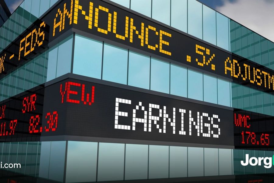 Stock ticker display on a building showing the word earnings, ahead of Tesla's third-quarter 2026 earnings report on October 21