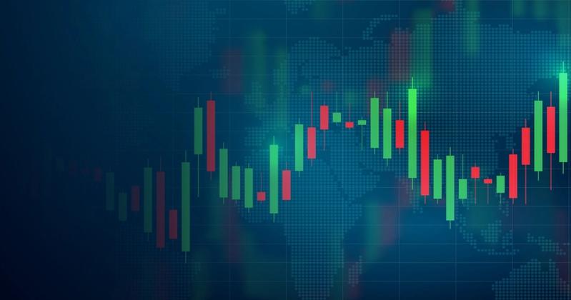 Candlestick chart on a dark screen reacting to the Federal Reserve's September 2026 rate hike