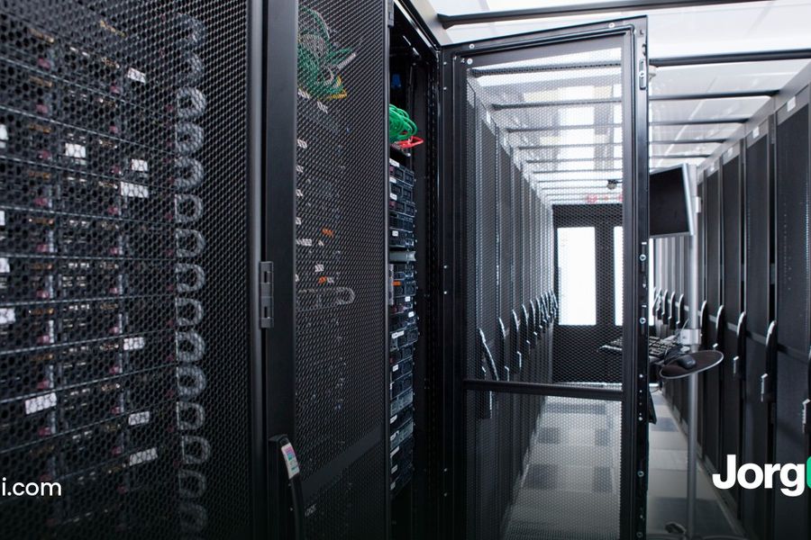Aisle of server racks in a data center, cover for the Super Micro preliminary results study