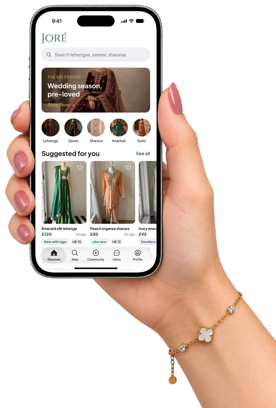 A hand holding an iPhone showing the Joré home screen with suggested pre-loved pieces