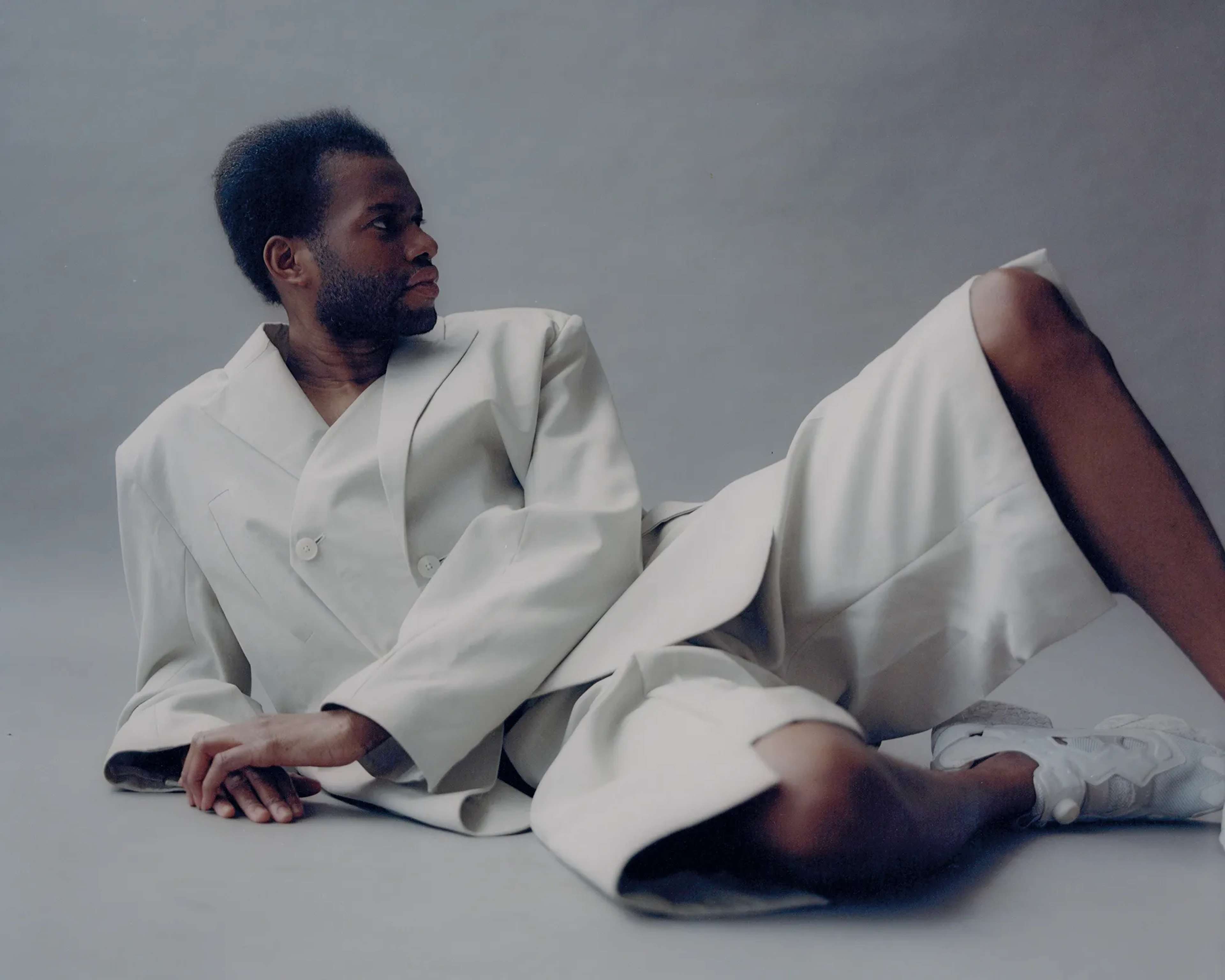 Full look CEREBRUM, shoes REEBOK.