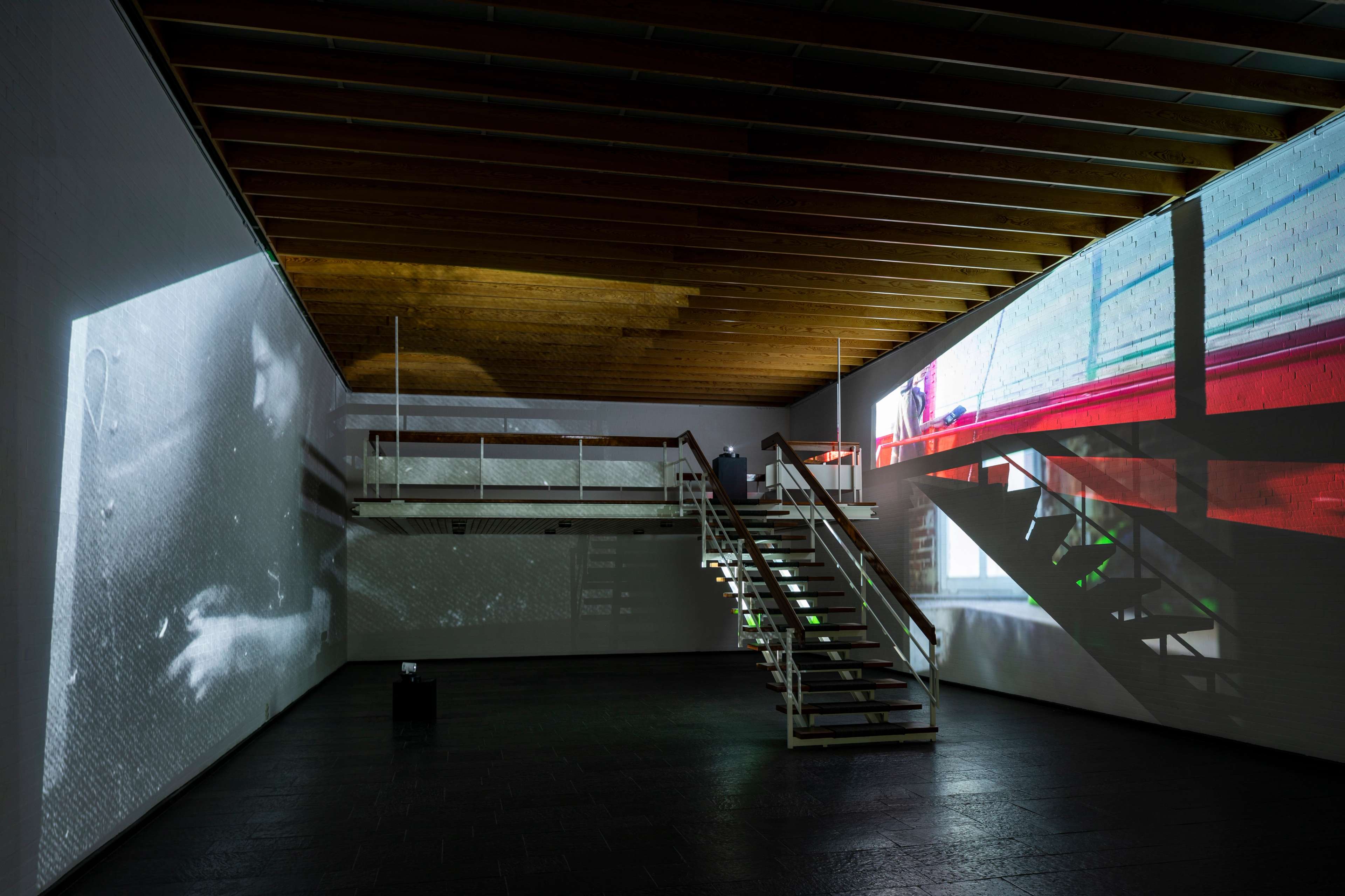 Luzie Meyer, “Ground, Bound, Found,” 2022. 3-channel video installation with rotating projectors. Installation view at Kunsthalle Bremerhaven, 2022. Courtesy of the artist, Kunsthalle Bremerhaven, Sweetwater, Berlin, and Fanta MLN.