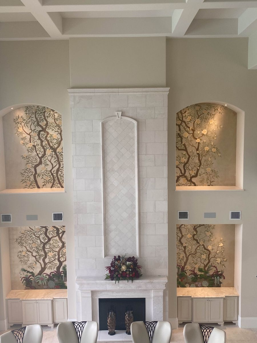 Chinoiserie hand-painted murals in four arched niches flanking marble fireplace, gold ground, great room