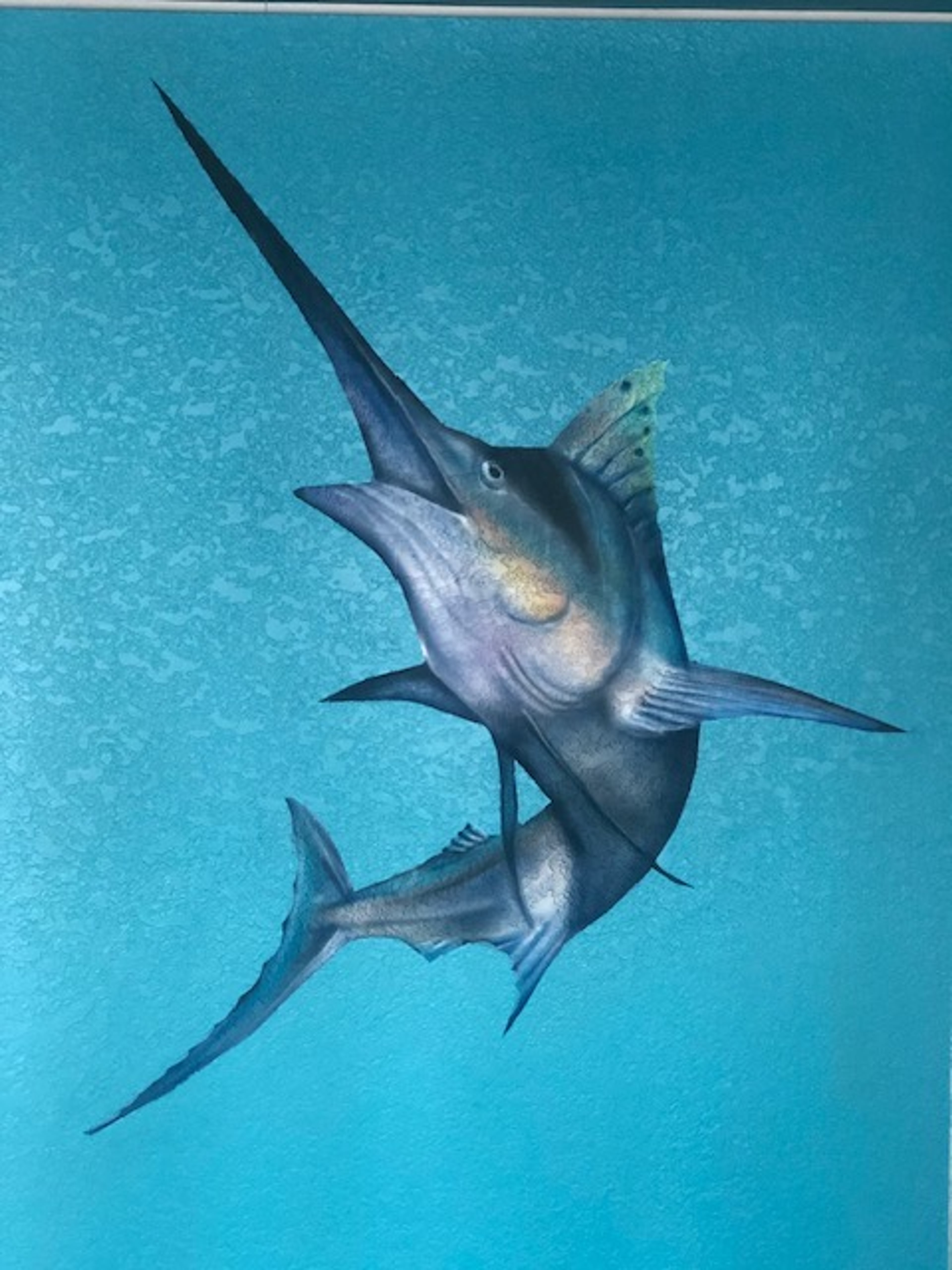 Hand-painted blue marlin sealife mural on commercial wall, Galveston themescape with teal ocean background, photorealistic.