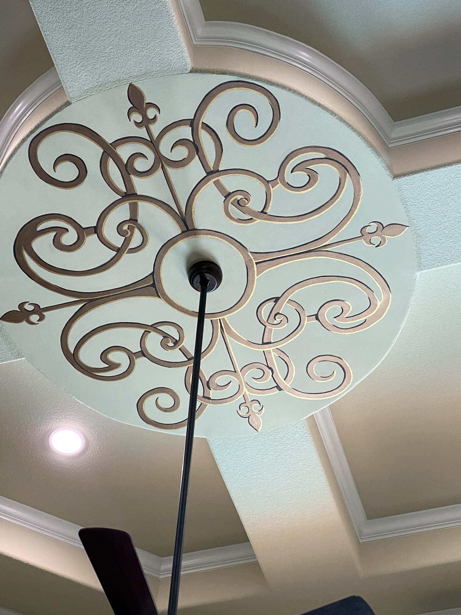 Modello stencil ceiling medallion with gold bronze scrollwork and fleur-de-lis on sage circular inset, Houston decorative finish