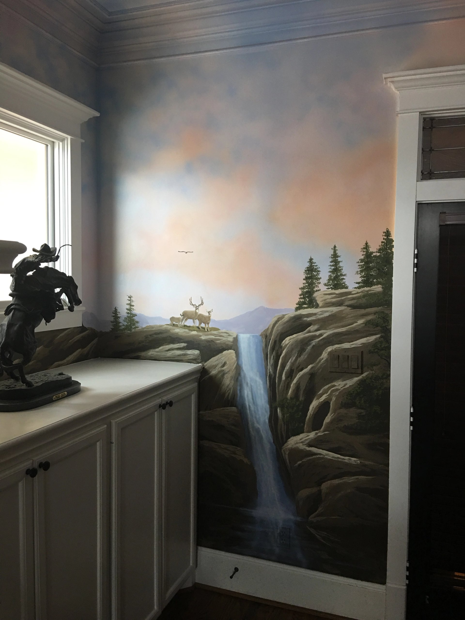 Early America Themescape mural, dear and waterfall
