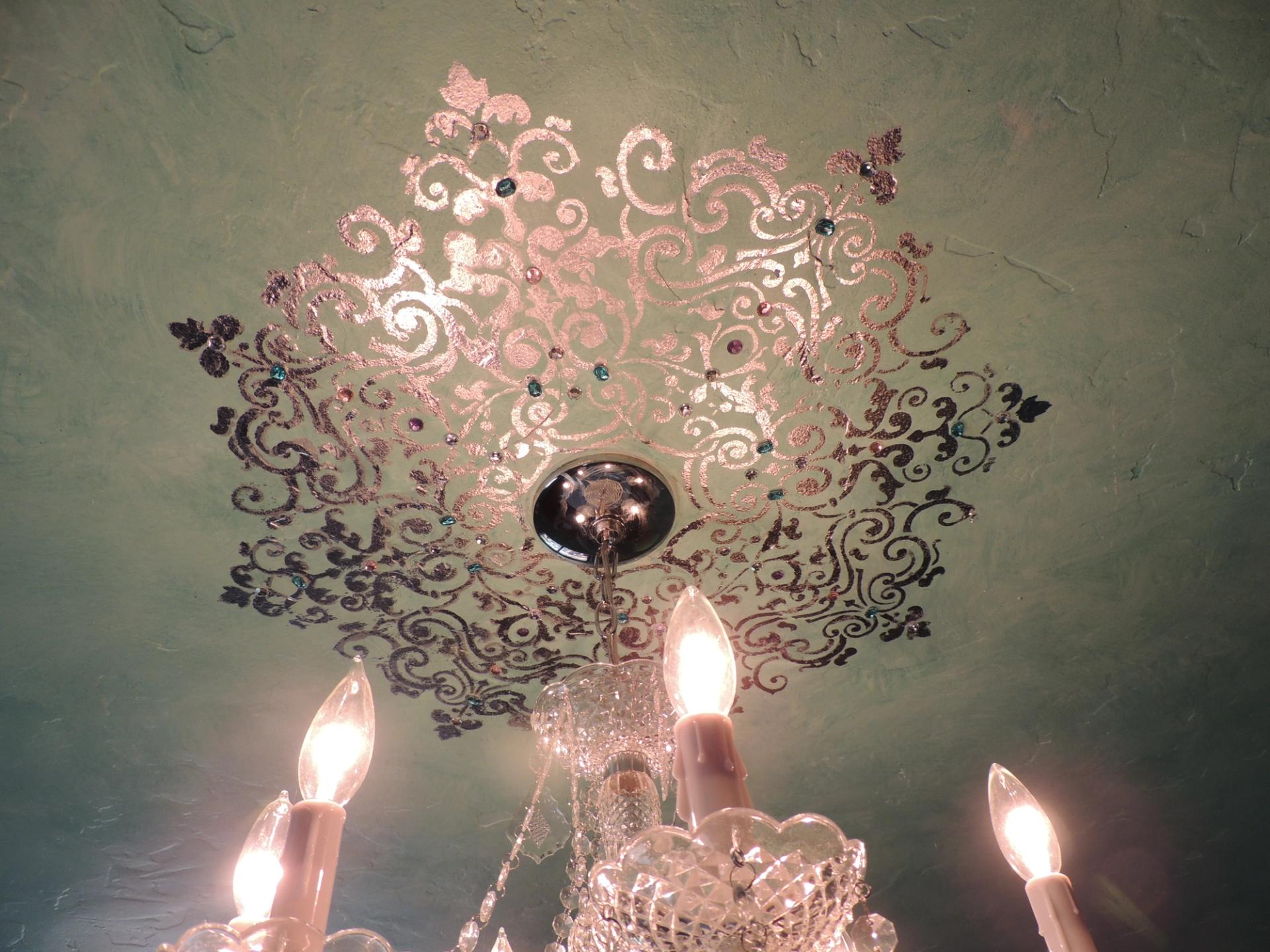 Rose gold and charcoal metallic damask stencil ceiling medallion with rhinestone accents over sage venetian plaster, Houston 
