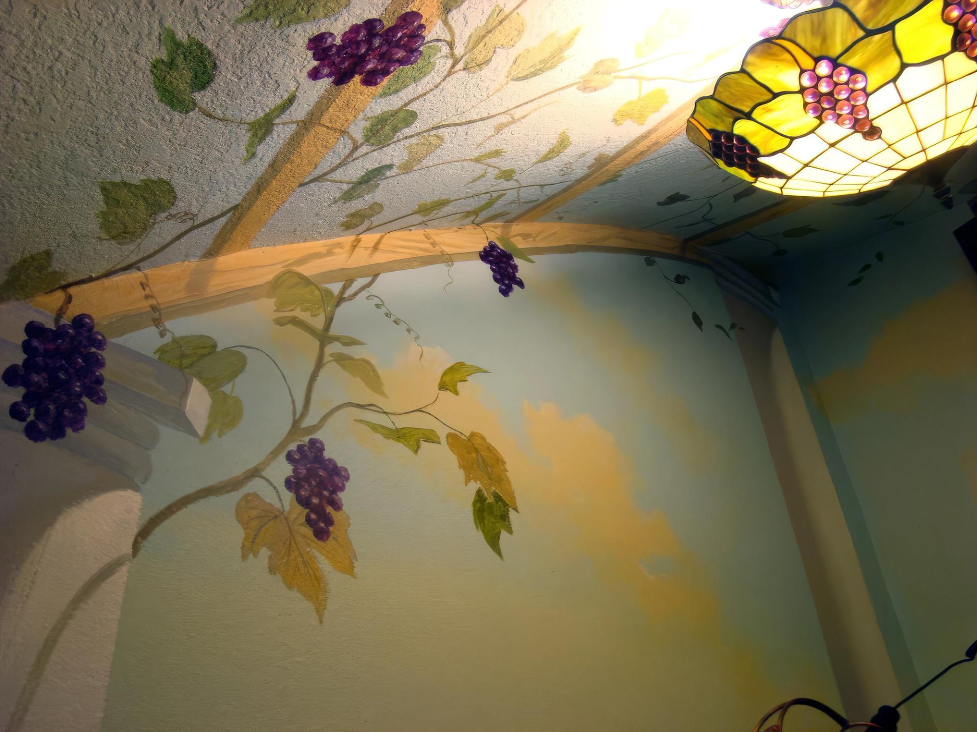 Hand-painted Italian vineyard grapevine mural with trompe l'oeil pergola spanning wall and ceiling, Houston TX