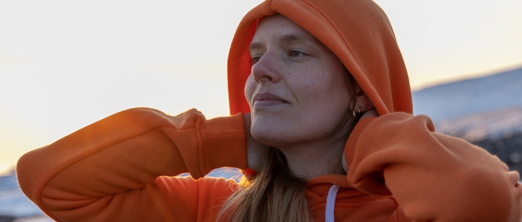 Aclima FleeceWool hooded sweater orange women's in merino wool