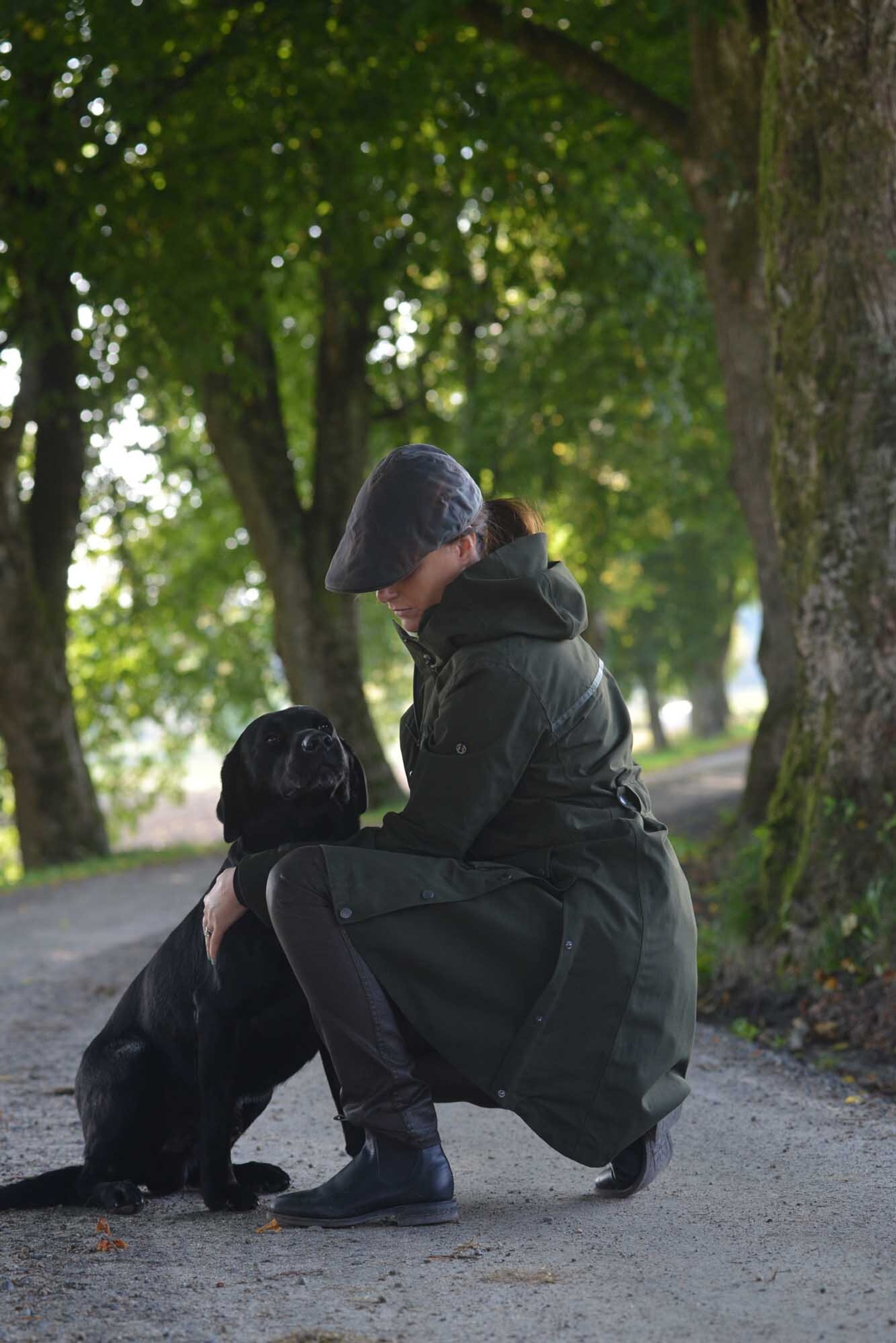 Fractus Raincoat for active women training their dog