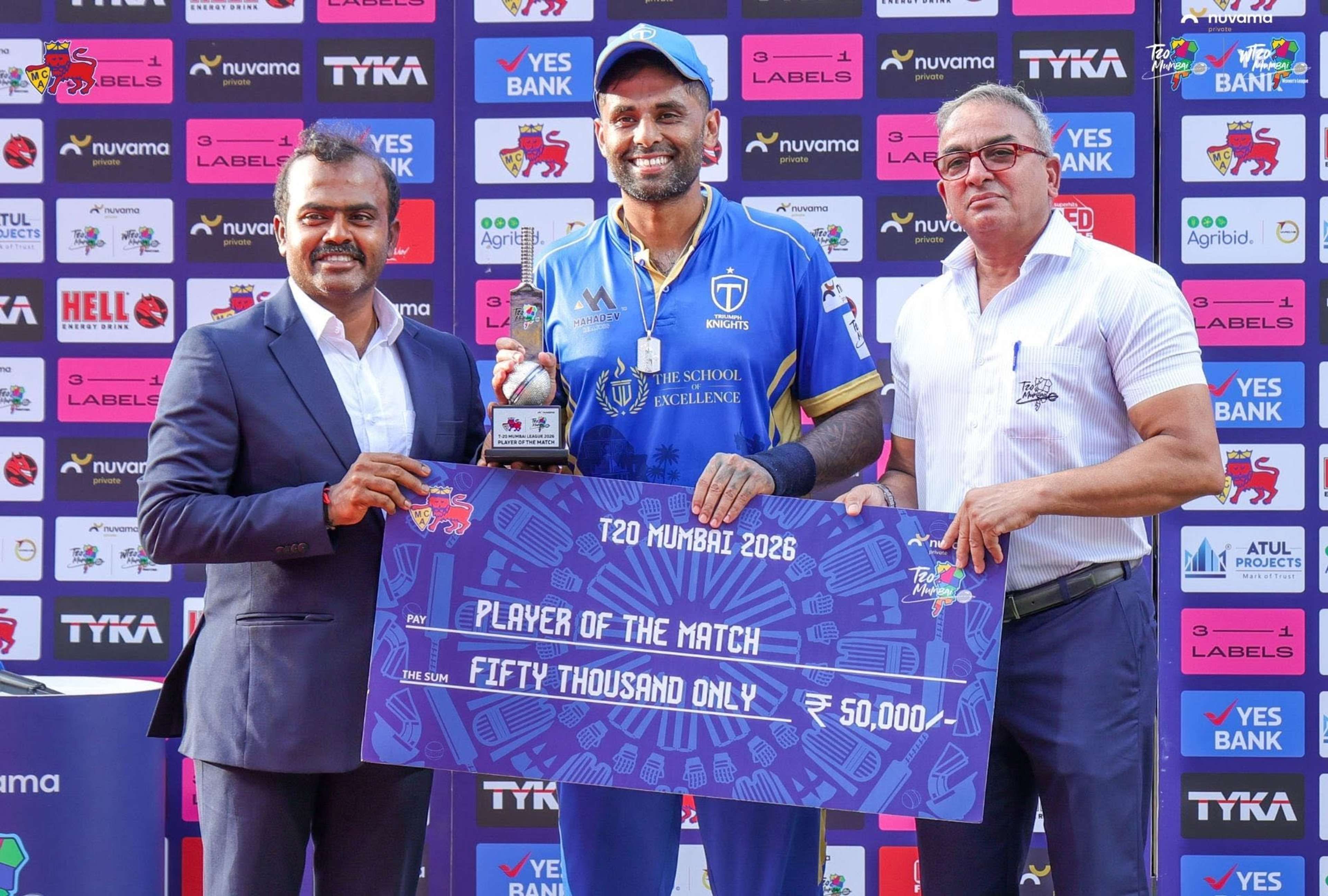 Suryakumar Yadav with MOTM Trophy