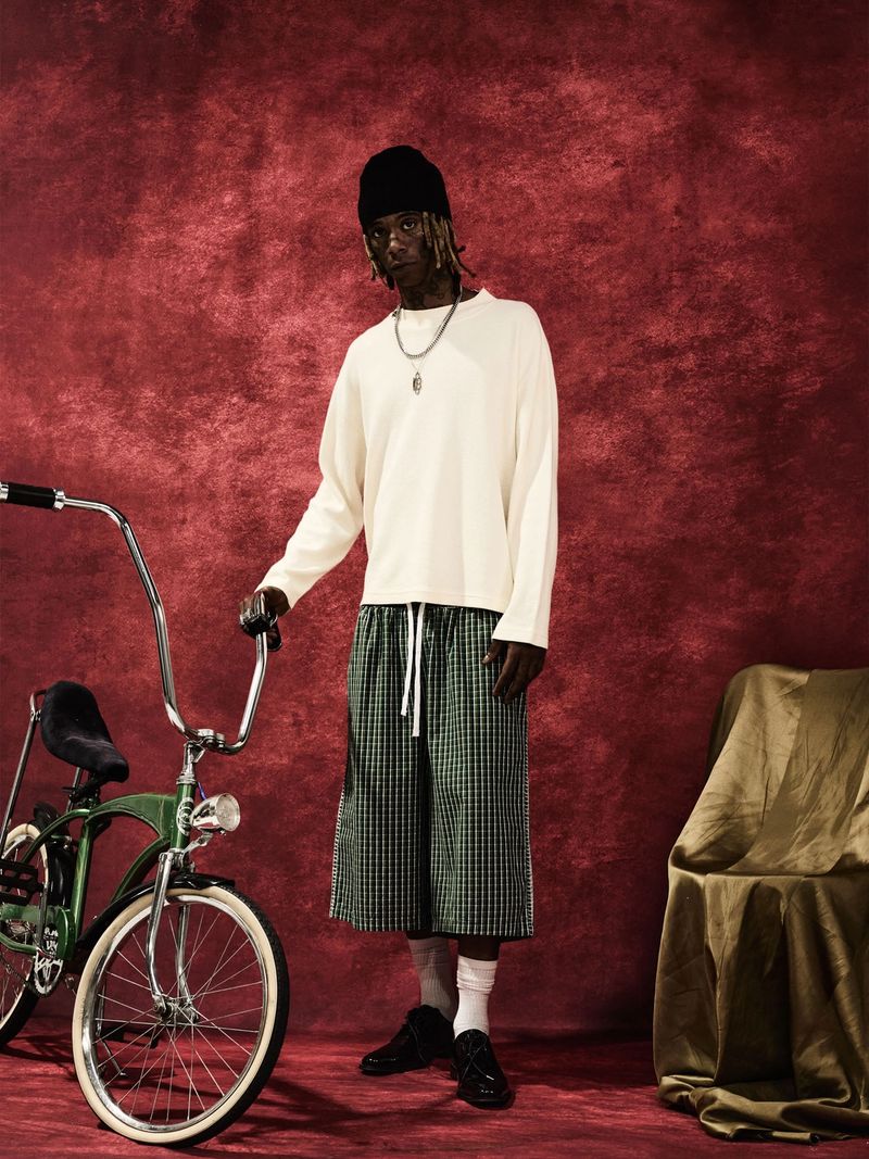 Model wearing our Oversized Long Sleeve and Baggy Plaid Shorts