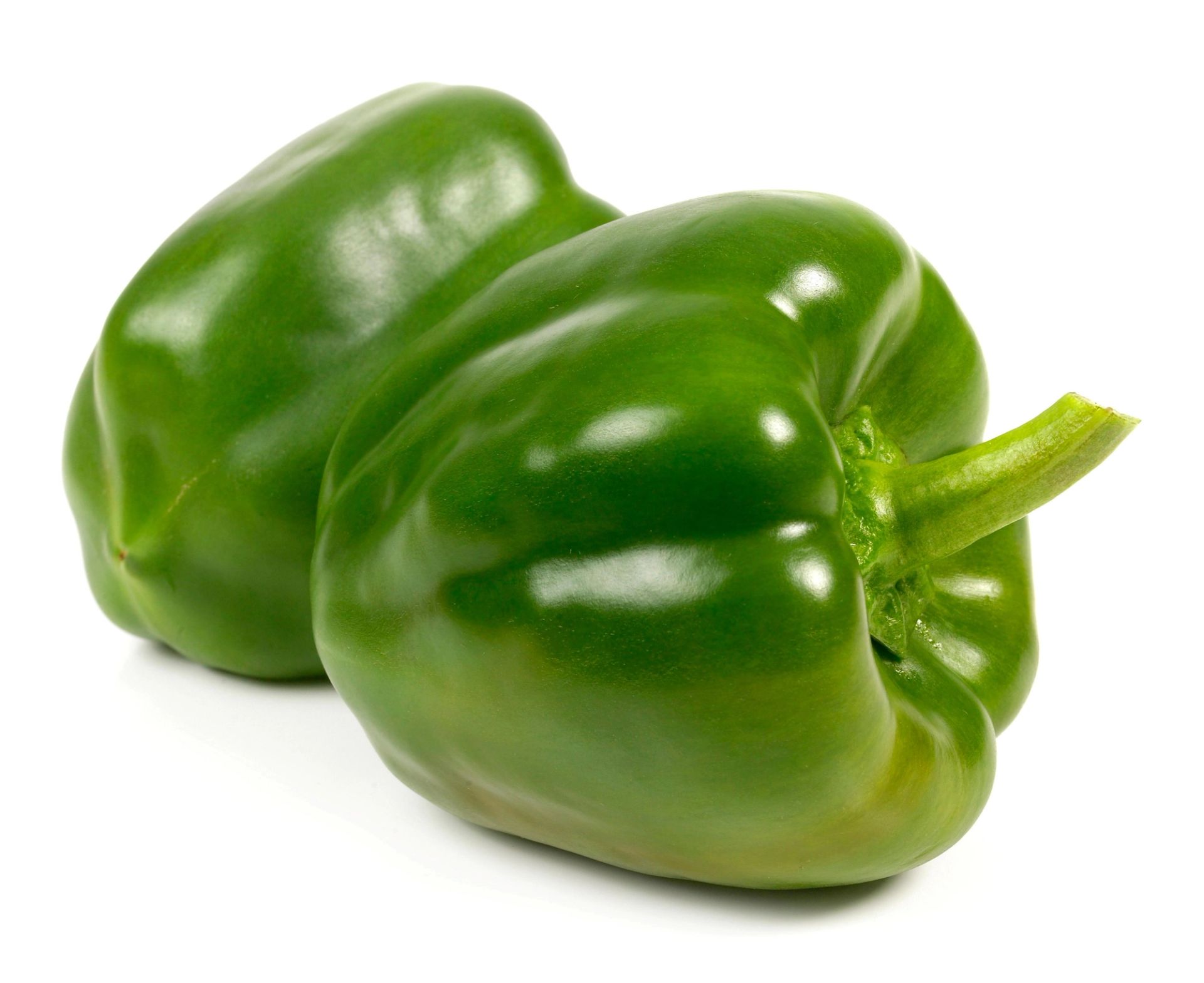 Grønn paprika med hvit bakgrunn