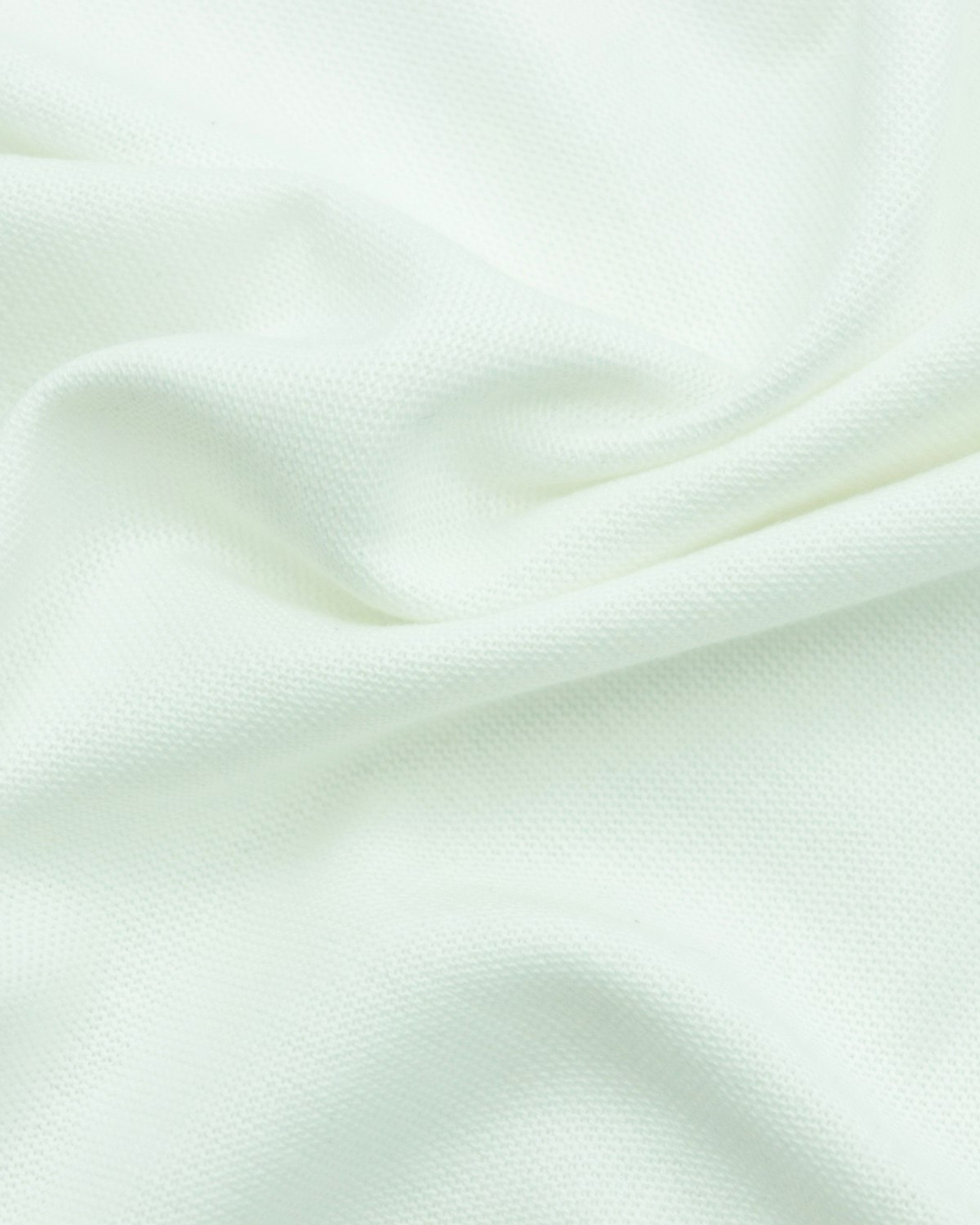 Plain, unembroidered cream muslin swaddle