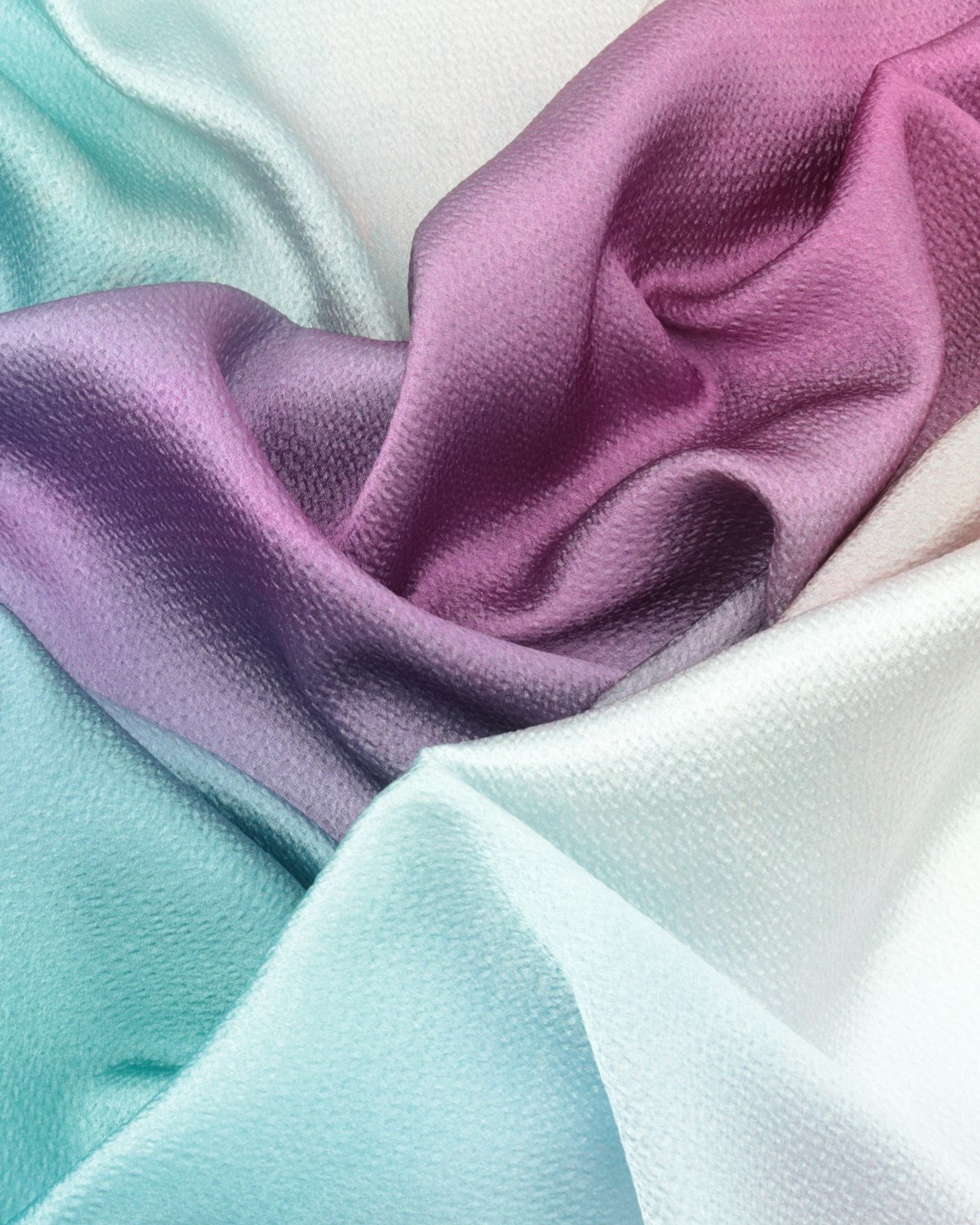 Soft mint and lilac cotton swaddle fabric