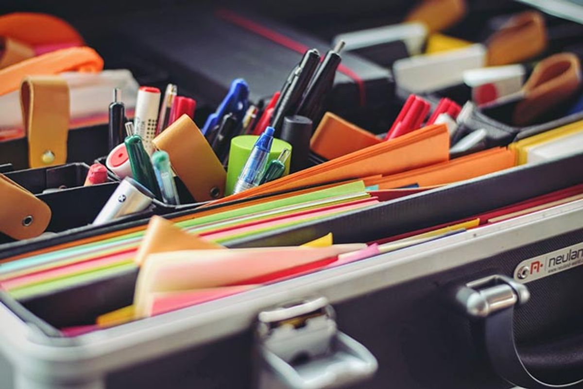A bag full of workshop material and stationary