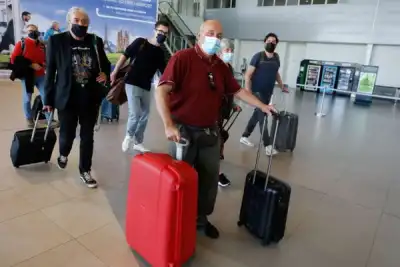 Image for Britons seeking sun and sand return to Portugal as travel ban ends