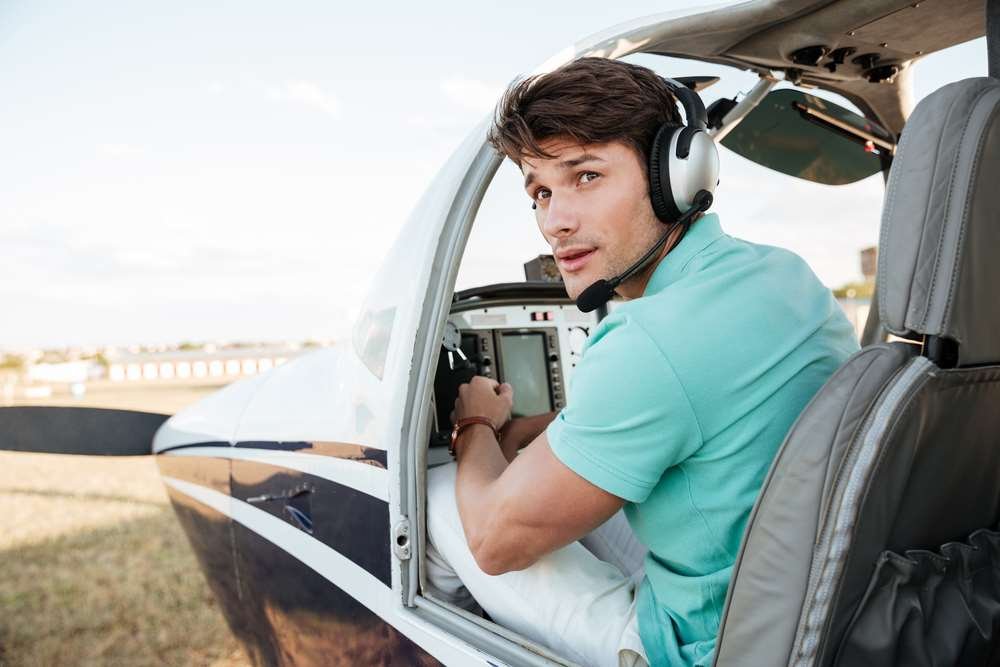 Pilot training flight with aircraft in the background - Global Banking & Finance Review