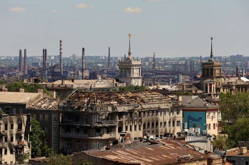 Image for Residents of captured Ukrainian port city try to survive among its ruins