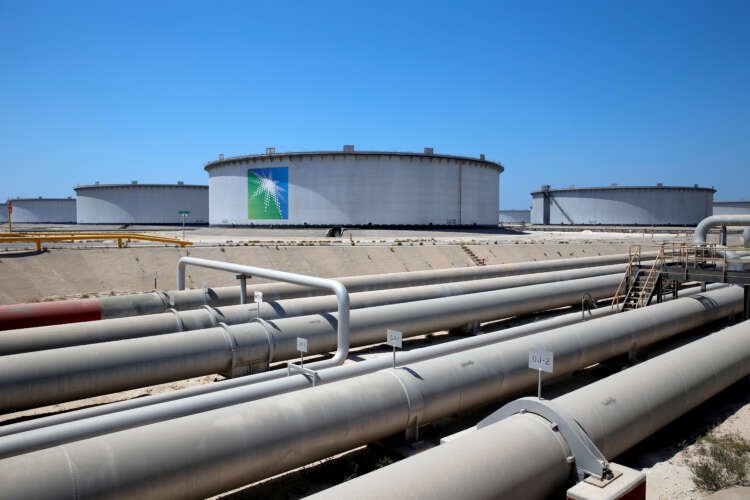 Saudi Aramco logo with oil pipeline, highlighting crude price cuts for Asia - Global Banking & Finance Review