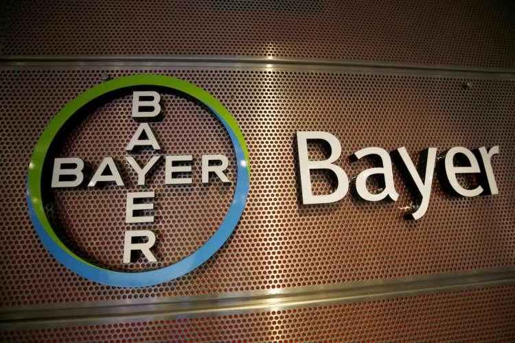 Bayer AG logo displayed during annual results conference on earnings report - Global Banking & Finance Review