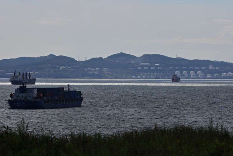Oil terminal in Nakhodka Bay with a container ship - Global Banking & Finance Review