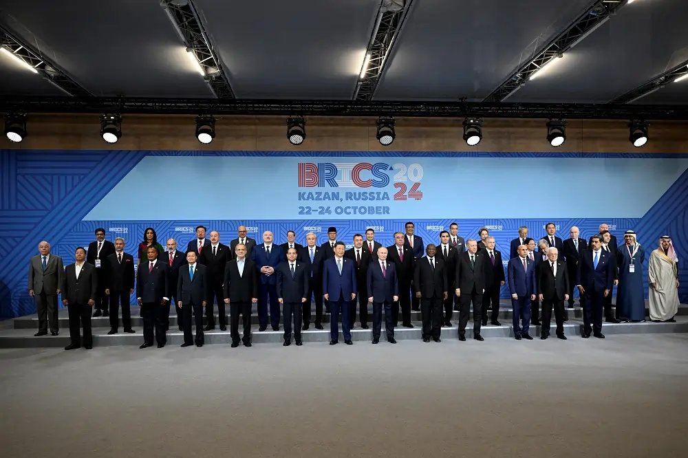 Leaders at the BRICS summit discussing global finance and geopolitics - Global Banking & Finance Review