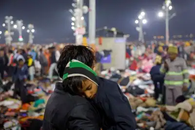 Image for Bodies, clothes, bags lie on ground after stampede at mass Hindu gathering in India