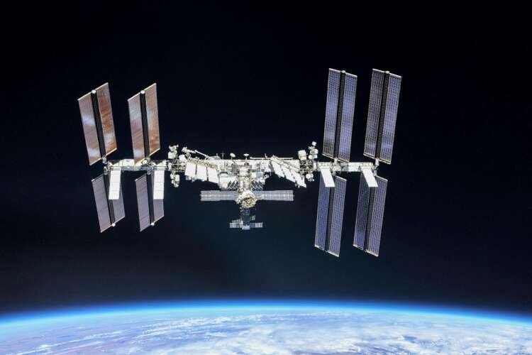 International Space Station over Earth, highlighting U.S.-Russia relations in space - Global Banking & Finance Review