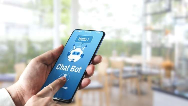 A friendly chatbot interface on a smartphone, symbolizing technology in banking - Global Banking & Finance Review