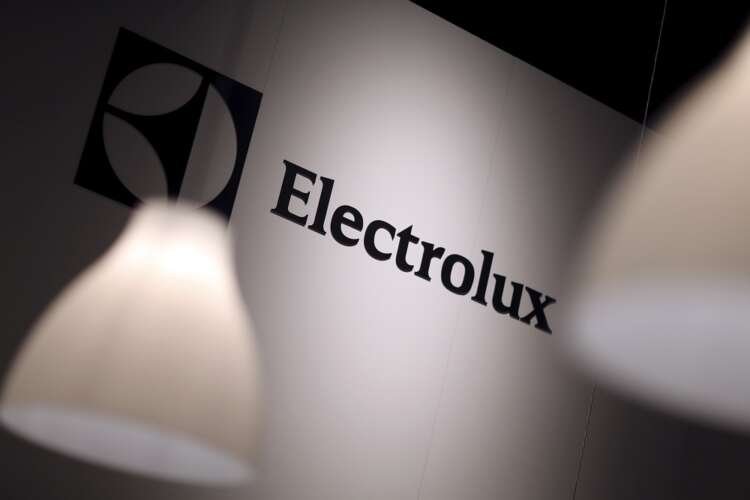 Electrolux logo displayed at IFA Electronics show, highlighting cost cuts and profit warnings - Global Banking & Finance Review