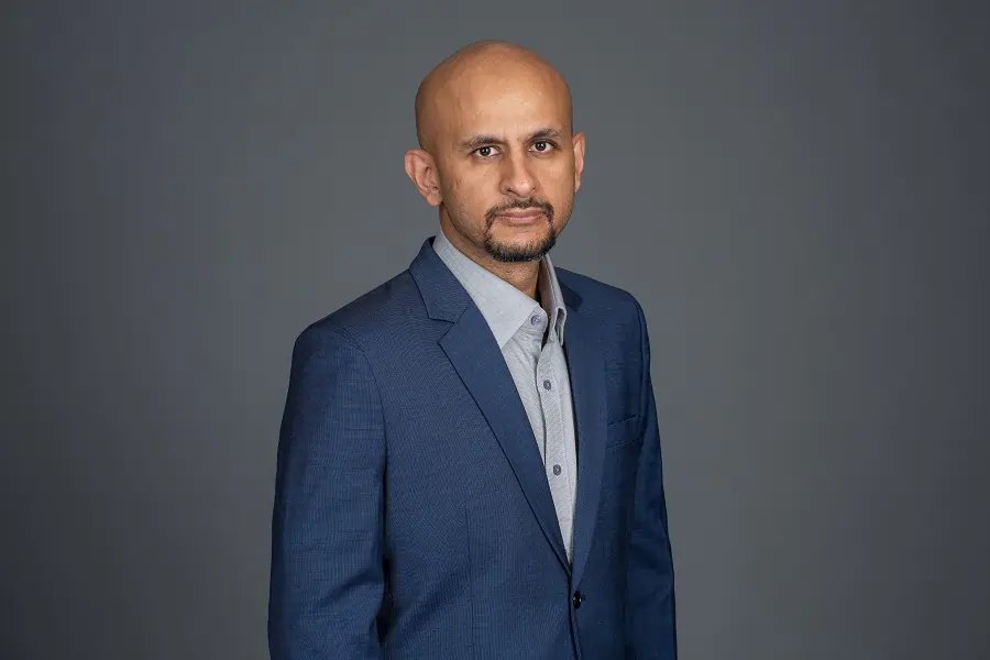 A professional examining payment systems for gig workers - Global Banking & Finance Review