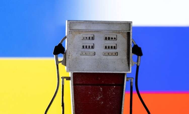 Illustration of petrol pump with Ukraine and Russian flags, symbolizing oil market shifts - Global Banking & Finance Review