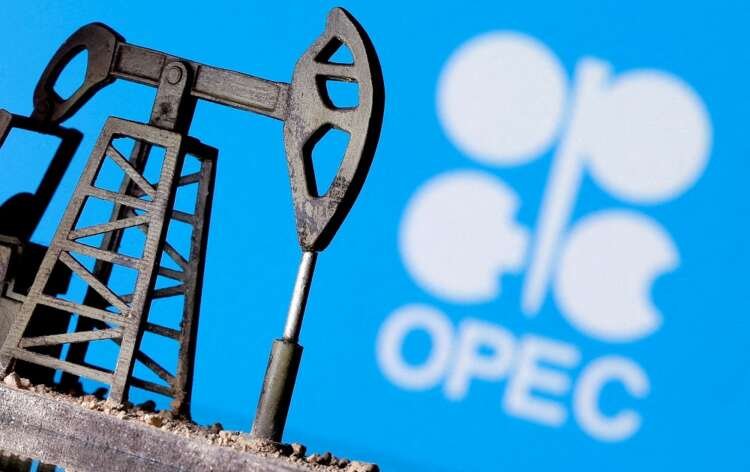 FILE PHOTO: A 3D-printed oil pump jack in front of the OPEC logo in this illustration picture