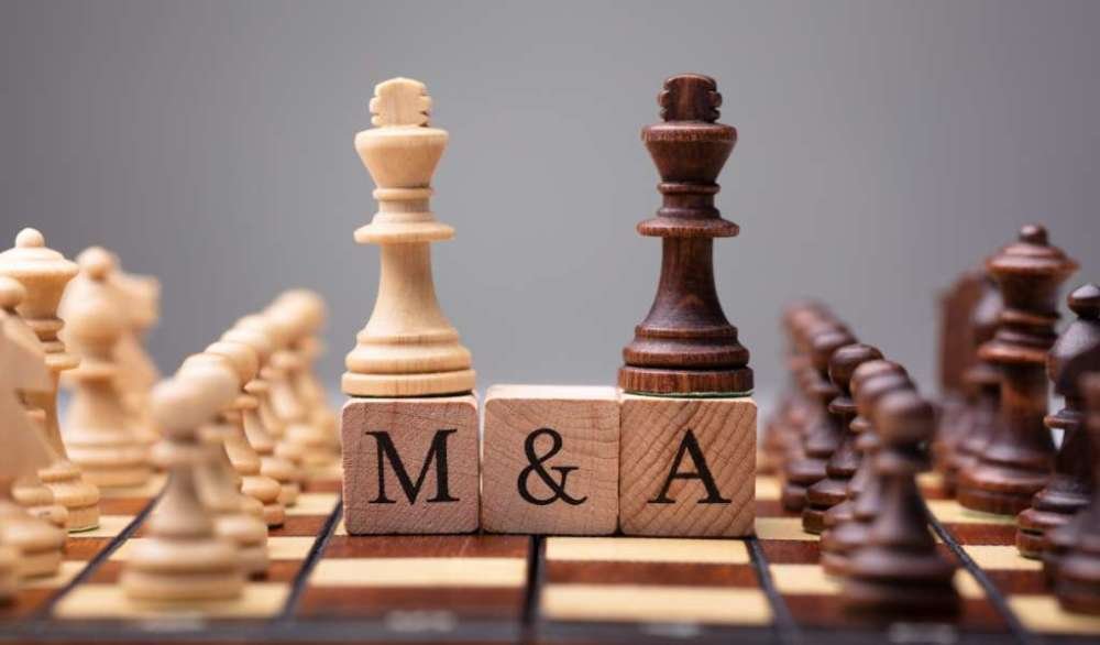 Business professionals analyzing data for M&A due diligence in finance - Global Banking & Finance Review