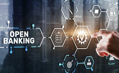 Illustration of a user interacting with Open Banking APIs on a digital screen - Global Banking & Finance Review