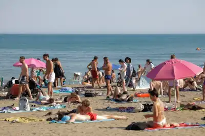 Image for Analysis-Package deals make a comeback as sun seekers count the cost