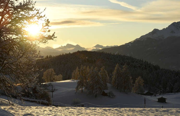 Scenic mountain landscape in winter, symbolizing the need for green economic stimulus - Global Banking & Finance Review