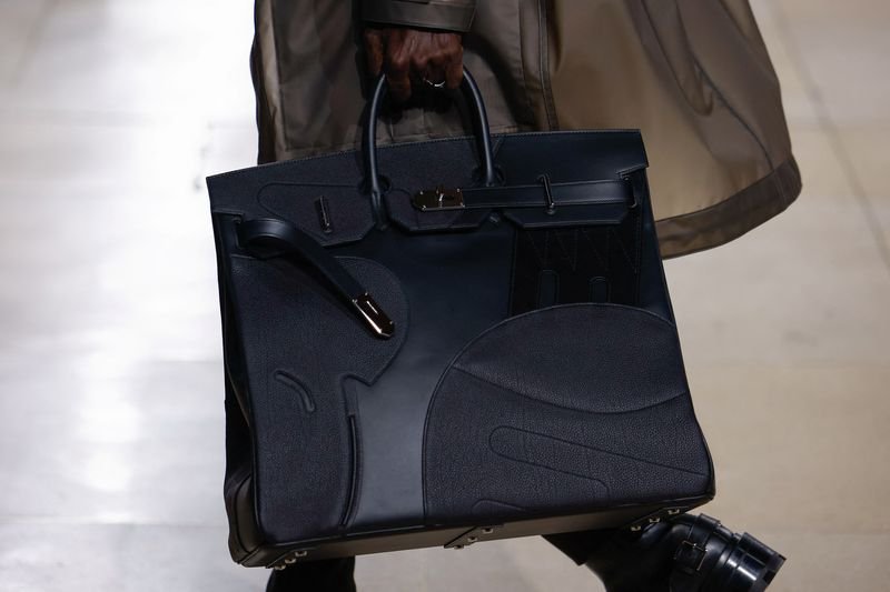 Luxury Birkin bags showcased, symbolizing Hermes' strong sales surge - Global Banking & Finance Review